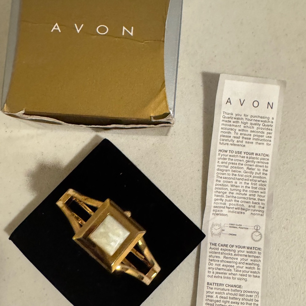 Avon Gold and White Women's Watch